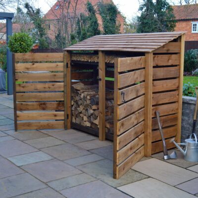 TRLS6-SLT-DR-KS-RBR - Normanton 6ft Log Store - Slatted Sides - With Doors - With Shelf - Rustic Brown - Front Right View - With Logs